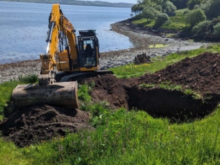 A hole being dug for a septic tank