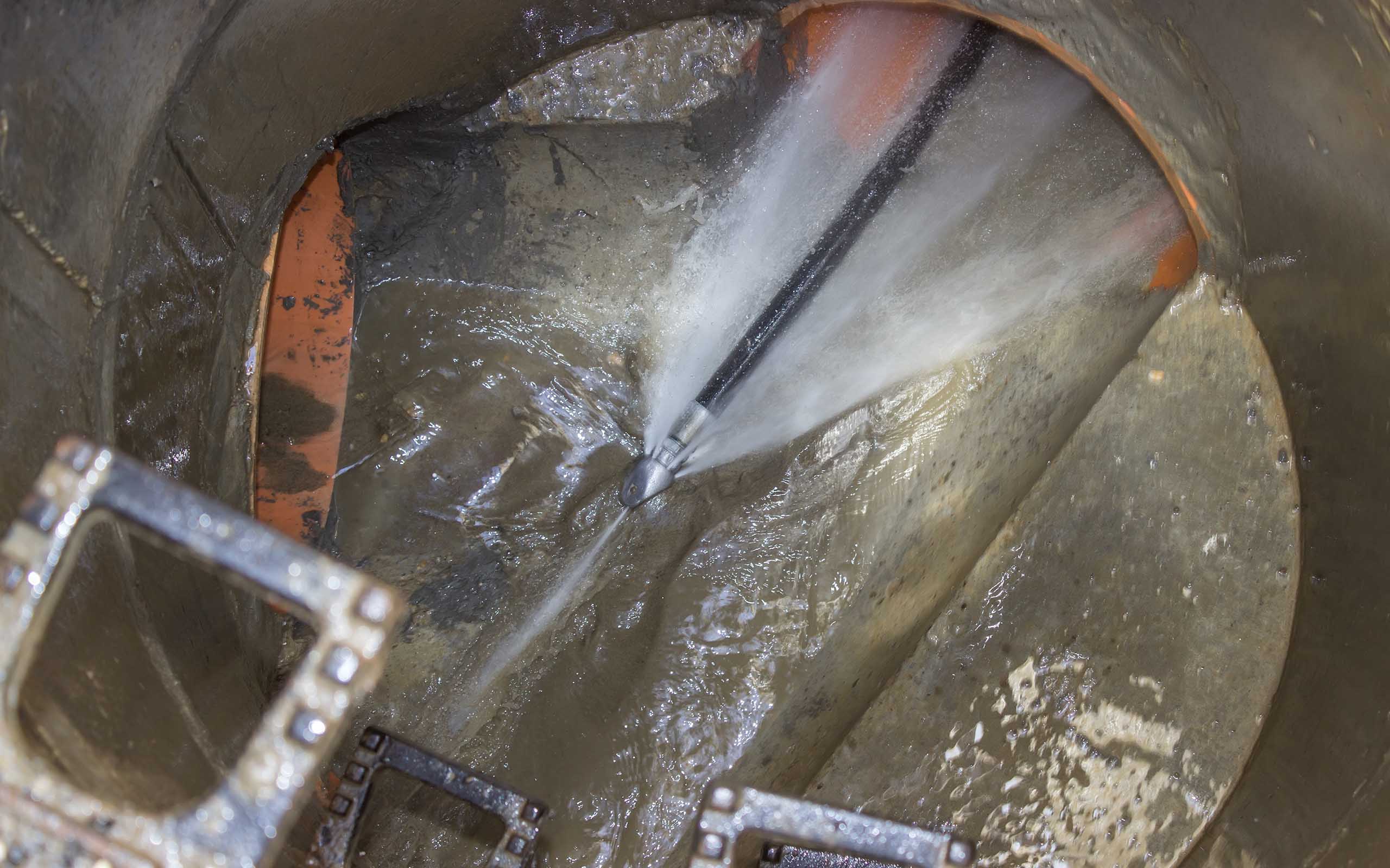 A drain being unblocked with high pressure jetting