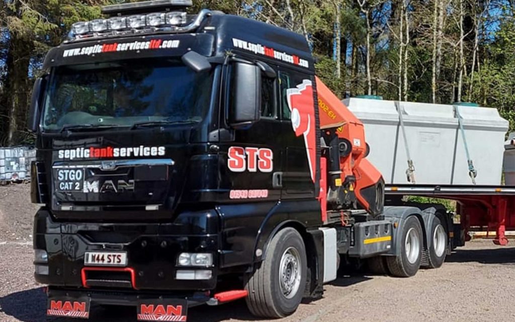 A Septic Tank Services with septic tanks in on board