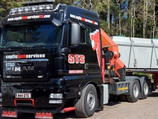 A Septic Tank Services with septic tanks in on board