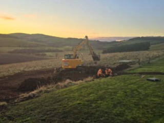 Ground works working on the soakaway during the installation of a septic tank being installed by Septic Tank Services Ltd