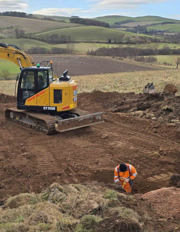 Ground works working on the soakaway during the installation of a septic tank being installed by Septic Tank Services Ltd