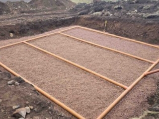 A soakaway being installed by Septic Tank Services Ltd