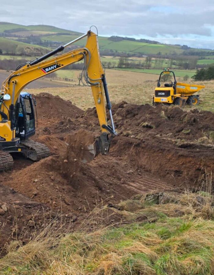 Ground works working on the soakaway during the installation of a septic tank being installed by Septic Tank Services Ltd