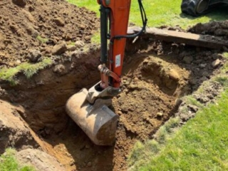 Groundworks preparing a hole to install and septic tank by Septic Tank Services Ltd