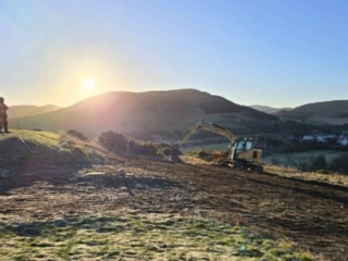 Ground works working on the soakaway during the installation of a septic tank being installed by Septic Tank Services Ltd